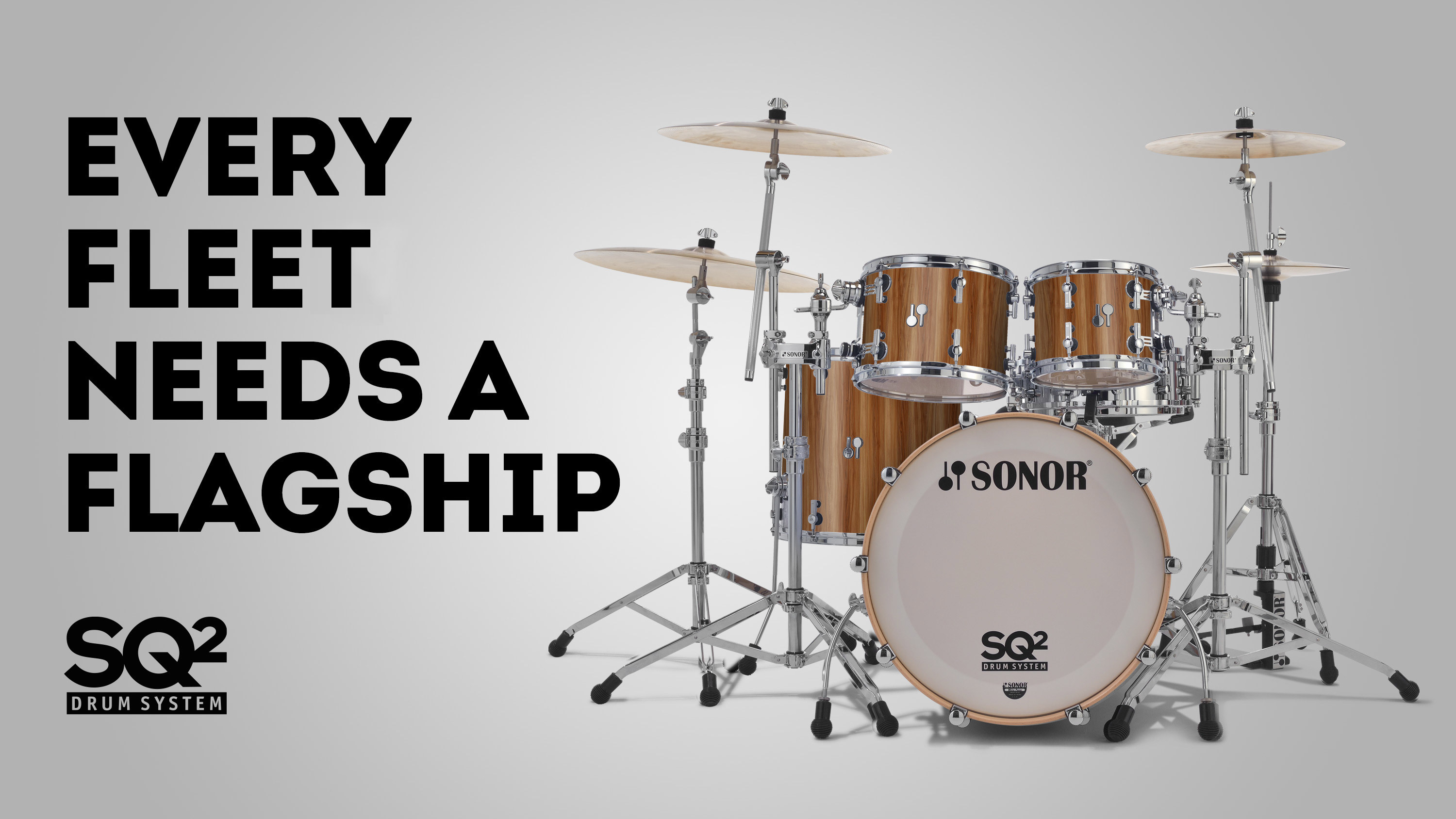 Sonor SQ2 drum kit, isolated on a gray background, with the promotional headline "Every fleet needs a flagship"